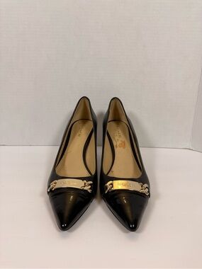 Coach Black Leather Pointed Toe Pumps with Gold Plaque